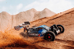 Corally Syncro-4 Buggy 4WD 3-4S RTR (oranžová)