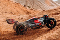 Corally Syncro-4 Buggy 4WD 3-4S RTR (oranžová)