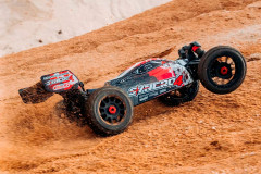 Corally Syncro-4 Buggy 4WD 3-4S RTR (oranžová)