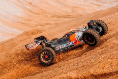 Corally Syncro-4 Buggy 4WD 3-4S RTR (oranžová)